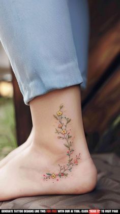 a woman's foot with a flower tattoo on her left side and the bottom part of her leg