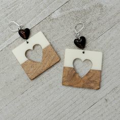 Wooden Boho Style Heart Cutout Earrings made with Sterling Silver Leverbacks and Amber glass Heart accent bead are a great way to celebrate God's Love as they are Flirty, Classic and On Trend. They are Lightweight, Comfortable in the ears and great for people with sensitive ears. Handmade Brown Jewelry For Valentine's Day, Brown Heart Shaped Jewelry With Heart Beads, Adjustable Heart-shaped Earrings, Resin Block, Earrings Wood, Wood And Resin, Glass Heart, Heart Beads, Rose Gold Earrings