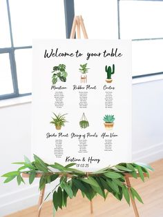 a welcome sign with potted plants on it and the words welcome to your table