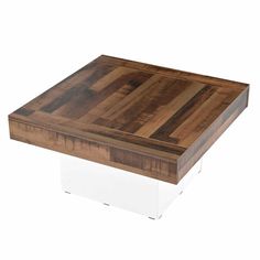 a square wooden table with white legs