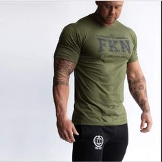 Gym T shirt   Varsity Khaki Easy 30 day return policy Gym Shirts Mens, Green Gym, Gymwear Outfits, Bodybuilding Clothing, Gym Wear Men, Mens Gym, Gym Outfit Men, Mens Khakis, Comfortable Tops