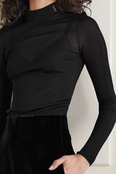 Luxury Casual Turtleneck With Ribbed Cuffs, Luxury Elegant Tight Bottoms, Chic High Stretch Ribbed Tops, Chic Spring Turtleneck, Stretch Turtleneck Knit Top For Layering, Chic High Neck Tops For Evening, Chic Stretch High Neck Blouse, Elegant Stretch Mock Neck Top For Fall, Elegant Fitted Turtleneck With Ribbed Neckline