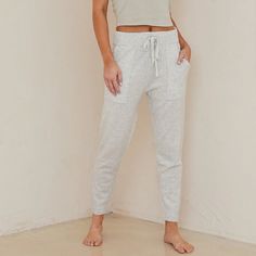 100% Cashmere Super Comfortable Pocket Jogger Pant. Color: Heather Snow Relaxed White Bottoms With Pockets, Spring Lounging Pants With Pockets, Spring Lounging Sweatpants With Pockets, Spring Bottoms With Side Pockets For Lounging, High Waist Pants With Pockets For Lounging, High Waist Bottoms With Pockets For Lounging, High-waist Lounge Bottoms With Pockets, High Waist Lounging Bottoms With Pockets, White Sweatpants With Pockets For Lounging