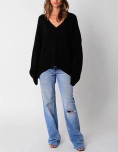 Our Elsie Sweater features a plunging v-neck and a oversized fit. 100% acrylic Made in China Buckle Bunny, Made In China, Sock Shoes, Skirt Pants, Sweater Jacket, Black Sweaters, Halloween Shopping, Top Outfits, China