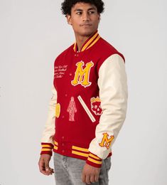 Miami Heritage Varsity Bomber Jacket In Red Unleash vibrant style with the miami heritage varsity bomber jacket. Crafted from premium wool with a quilted inner shell, it offers both warmth and trendiness. The Miami Heritage Edition detailing adds an exclusive touch. Snap button closure, rib-knit collar and cuffs, and two side pockets combine for a classic varsity look. Make a statement in bold red. Outer Shell: Wool Inner Shell: Quilted Feature: Miami Heritage Edition Closure Style: Snap Buttons Leather Shorts Women, Short Leather Skirts, Leather Jumpsuit, Vibrant Style, Sheepskin Jacket, Studded Jacket, Distressed Jacket, Western Jacket, Bullet Points