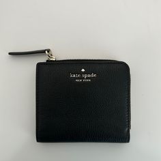 Brand New Without Tags! Good Leather Material, Very Convenient Wallet Kate Spade Rectangular Coin Purse For Everyday, Kate Spade Bifold Wallets For Gifts, Kate Spade Compact Wallet For Everyday, Kate Spade Bifold Coin Purse, Kate Spade Compact Everyday Wallet, Classic Kate Spade Wallets For Daily Use, Versatile Black Wallet Perfect For Gifts, Versatile Black Wallet Perfect As Gift, Versatile Black Wallet As Gift