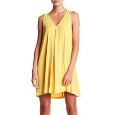 Feel Vacation Ready In This Sleeveless Swing Dress. A Great Summery Staple That Can Be Easily Accessorized. The Stock Photos Look Like A Pale Yellow But I Would Say It’s More Of A Beautiful, Bright Sunflower Color In Real Life. Brand New With Tags. Approx. 33.5" Length (Size S) - Imported Fiber Content: 96% Polyester, 4% Spandex Care: Machine Wash Cold Additional Info Model's Stats For Sizing: - Height: 5'8.5" - Bust: 32" - Waist: 25" - Hips: 34" Model Is Wearing Size S. Chic Yellow Sleeveless Mini Dress, Chic Yellow Sleeveless Dress, Yellow Sleeveless Mini Dress For Day Out, Chic Yellow Sleeveless Dress For Spring, Yellow Flowy Sleeveless Mini Dress, Flowy Sleeveless Yellow Mini Dress, Yellow Flowy Sleeveless Sundress, Yellow V-neck Sleeveless Sundress, Yellow Sleeveless V-neck Sundress