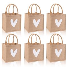 six bags with white hearts on them