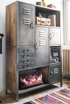 an old metal locker with some shoes in it's drawer and a rug on the floor