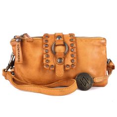 a brown leather purse with studded details and a metal buckle on the front pocket