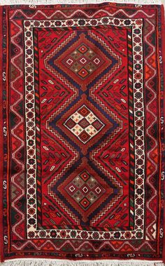 an old rug with many different colors and patterns