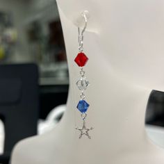 Show your patriotic spirit with our Red, White, and Blue Star Drop Earring Kit. This kit includes everything you need to create a pair of dazzling earrings perfect for any festive occasion: Swarovski Crystals: Red, blue, and clear Swarovski crystals that sparkle brilliantly, adding vibrant color and elegance. Sterling Silver Components: High-quality sterling silver eye-pins, headpins, flat with coil ear wires, and charming star accents for a polished and cohesive look. This kit is ideal for jewe Crystals Red, Dazzling Earrings, Earring Kit, Jewelry Making Kits, Silver Eye, Beading Tools, Bracelet Kits, Jewelry Kits, Gold Filled Earrings