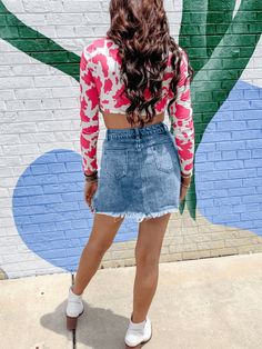 Be a dazzler in the Krysten Denim Mini Skirt! This awesomely fashionable skirt features elegant sequins and an on-trend fringe tassel hem, so you'll never blend in with the crowd. Step into the night in standout style! #shinebright Size Guide: Influencer is 5’6” tall, and has a 33.25” bust, 26.5” waist, & 35.6” hips. She is wearing a S / US 4 / AU 8. This Skirt is true to size. Material: 100% cotton. Feature: Denim Fabrication. Sequins Fringe Pocket. Pocketed. Tassel Hem. Care Instructions: Mach Spring Party Bottoms With Frayed Hem, Trendy Stretch Mini Skirt With Frayed Hem, Trendy Mini Denim Skirt With Frayed Hem, Stretch Denim Skirt For Summer Party, Chic Mini Skirt With Frayed Hem For Spring, Spring Party Stretch Denim Skirt, Chic Spring Mini Skirt With Frayed Hem, Fitted Denim Mini Skirt With Frayed Hem, Chic Frayed Hem Mini Skirt For Spring