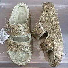 Brand New Crocs Classic Cozzzy Glitter Sandal 208124-93s. Gold Glittery. Size Women’s 11 Or Men’s 9. Slides Style That Hold Crocs Charms. From A Smoke-Free Home. Casual Glitter Sandals For Spring, Casual Glitter Sandals With Synthetic Material, Casual Glitter Synthetic Sandals, Casual Flat Glitter Sandals, Casual Glitter Sandals, Casual Open Toe Glitter Sandals, Crocs Charms, New Crocs, Shoes Crocs