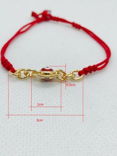 "Pulsera hecha a mano con el ojo rojo para la proteccion en oro chapeado terminado con hilo rojo reforzado delgado. hecha exclusiva para mujer. pulsera ajustable y expandible con cierre de candado minimo de 6.5\" pulgadas y maximo de 7\" pulgadas Aviso : si no es de su medida la pulsera; contactenos antes de comprar porque podemos hacer la medida que desea material: hilo rojo reforzado #A bola del mal ojo rojo 6mm cadena y del mal ojo en oro chapeado" Adjustable Gold Charm Bracelet With Evil Eye, Adjustable Red Metal Charm Bracelet, Red Metal Bracelet With Adjustable Chain, Gold Metal Evil Eye Bracelet As Gift, Gold Metal Evil Eye Bracelet For Gift, Red Gold Plated Bracelet, Red Evil Eye, Sliding Knot, Black Bracelets