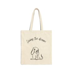 This 100% cotton bag comes in one size - 15" x 16"- perfect for everyday wear. While the canvas material will show off your designs in great colors, it's durable and will last for years. The bag features 20" handles (made from the same canvas), making it easy to carry even with a week's worth of shopping. .: 100% cotton canvas .: Heavy fabric (12 oz/yd² (406.9 g/m .: Sewn-in label .: Available in natural and black colors Large Cotton Canvas Bag For Everyday, Large Cotton Everyday Bags, Trendy Cotton Softback Bags, Large White Cotton Shoulder Bag, Eco-friendly Cotton Canvas Bag With Dust Bag, Large Cotton Canvas Bag For Gifts, Large Cotton Canvas Bag For Gift, Large Cotton Canvas Gift Bag, Everyday Cotton Canvas Gift Bag