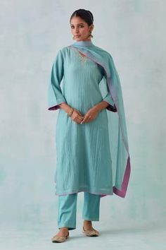 Teal blue chanderi kurta with sequin and thread embroidery. Paired with a cotton pant and chanderi dupatta. - Aza Fashions Blue Cotton Silk Churidar With Zari Work, Blue Straight Kurta With Dupatta, Blue Cotton Silk Churidar For Navratri, Blue Cotton Silk Salwar Kameez With Mirror Work, Blue Straight Kurta With Mirror Work, Blue Cotton Silk Straight Kurta, Blue Cotton Silk Churidar With Dabka Work, Blue Cotton Silk Salwar Kameez With Straight Kurta, Festive Blue Cotton Silk Churidar