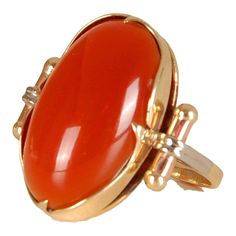 14K yellow gold statement ring with a large carnelain agate stone cabochon cut. diameter size 19 US size 9,  Approx weight 5 gram Yellow Gold Carnelian Oval Cabochon Ring, Carnelian Yellow Gold Rings With Oval Cabochon, Yellow Gold Oval Cabochon Carnelian Rings, Carnelian Agate, Gold Statement Ring, Carnelian Stone, Cabochon Ring, Cabochons Stones, Gold Accent