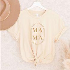 Women’s Plus Size Mama Graphic T-Shirt Color Is Cream Relaxed Fit Shirt Sleeve Crew Neck Soft And Comfy Tags Womens,Tee,Shirt,Crew Neck,Summer,Spring,Graphic,Mama,Relaxed Fit, Gold T-shirt With Letter Print For Summer, Beige Tops With Text Print For Spring, Gold Letter Print Top For Summer, Gold Letter Print Tops For Summer, Spring Gold Graphic Print T-shirt, Gold Crew Neck Top With Text Print, Gold Short Sleeve Top With Text Print, Relaxed Fit Gold Cotton Top, Gold Crew Neck Cotton Top