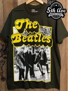 #thebeatles #johnlennon #paulmccartney #georgeharrison #ringostarr #englishrockband #pop #rock #rockband #rockt #rocktee #band #bandt #bandtee #bandtshirt #rockbandtshirt #rockbandtee #tshirt #tee #streetwear #vintagereprint #vintaget Vintage Screen Print T-shirt, Retro Fan Merchandise T-shirt, Retro Unisex T-shirt For Fan Merchandise, Unisex Retro T-shirt For Fan Merchandise, Retro Screen Print T-shirt, Nostalgic Crew Neck T-shirt With Screen Print, Nostalgic Cotton T-shirt With Letter Print, Unisex Retro T-shirt With Screen Print, Retro Gender-neutral Screen Print T-shirt