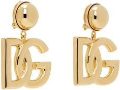 Pair of drop earrings in gold-tone brass. · Logo hardware at drop · Clip-on fastening · H2 x W1.5 Supplier color: Gold Designer Gold Jewelry With Gold-tone Hardware, Luxury Gold-tone Clip-on Jewelry, Designer Gold-tone Brass Jewelry, Classic Yellow Gold Earrings With Logo Plaque, Designer Yellow Gold Jewelry With Logo Lettering, Luxury Gold-tone Jewelry With Logo Lettering, Designer Gold Clip-on Jewelry, Luxury Clip-on Brass Jewelry, Formal Yellow Gold Jewelry With Gold-tone Logo Lettering