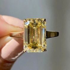 "Description: Main Stone:   Simulant  Diamond Main Stone Shape: Emerald Cut  Main Stone Color- Yellow Main Stone Weight: 4.00 Carat Side Stone:  Simulant  Diamond Metal Customization: 1. White Gold: 10K/14K/18K 2. Yellow Gold: 10K/14K/18K 3. Rose Gold: 10K/14K/18K 4. Silver: Sterling Silver 925 Metal / Colour / Purity Detailed Options:- 925 SL - 925 Sterling Silver  W/G - White Gold Y/G - Yellow Gold R/G - Rose Gold CZ Diamond - Simulant Diamond Size Customization: What Size you want... * You ca Luxury Yellow Citrine Diamond Ring, Yellow Emerald Cut Ring, Engagement Ring Citrine, Yellow Emerald Engagement Ring, Yellow Ring Engagement, Yellow Emerald Cut Diamond Ring, Yellow Gold Radiant Cut Sapphire Wedding Ring, Radiant Cut Gold Sapphire Anniversary Ring, Gold Radiant Cut Sapphire Ring For Anniversary