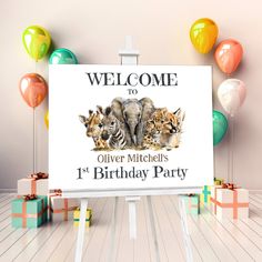 a welcome sign with two baby animals on it in front of balloons and gift boxes