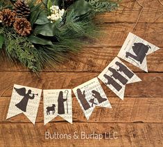 the bunting banner is decorated with silhouettes and words