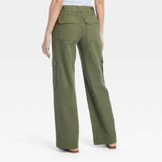 Elevate your wardrobe for casual get-togethers with these Mid-Rise Utility Cargo Pants from Universal Thread™. The full-length cargo pants feature a fly button and zipper closure for a secure fit, while side, back and flap cargo pockets add functional details. Made from midweight fabric with added stretch, it offers a comfortable, flexible fit for all-day wear. Wear it with your choice of tops to create a range of versatile outfits. Universal Thread™: Found exclusively at Target. Palooza Pants, Wide Cropped Pants, Olive Green Cargo Pants, Utility Cargo Pants, Cargo Pants Color, Gauze Pants, Leopard Pants, Black Cropped Pants, Green Cargo Pants