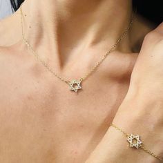 Introducing the Pave Star of David, a gorgeous and dainty accessory that is the perfect size. Carefully crafted with pave stones, this necklace is perfect by itself or layered with other pieces. Elevate your style with this elegant and versatile design.  About this item: Material: 18k Yellow Gold Filled Length: 16" with 1. 5" extension Cubic Zirconia Closure: Lobster Clasp Recommended to remove before showering, washing hands, swimming or any activities involving water. Avoid chemicals such as soaps, lotions, and perfumes. Store in sealed pouch when not wearing. Star Of David Necklace, Washing Hands, September Birthstone Jewelry, August Birthstone Jewelry, July Birthstone Jewelry, Jewelry Ring Box, Gifts For New Mums, Men's Jewelry Rings, Pearl Jewellery Earrings