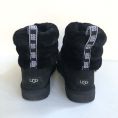 *100% Authentic And Brand New* Product Specs: O Suede Upper Fluff Sheepskin Cuff. O Pull Tab At The Rear. O Cushy Foam Footbed Covered With A Genuine Sheepskin That Naturally Wicks Away Moisture To Help Keep Your Feet Dry. O Treadlite By Ugg Outsole. O Nylon Binding. O Approx. Shaft Height 5.5". O Heel Height: 1 In 0 All My Ugg Are 100% Authentic, Brand New And Never Been Worn. * All My Ugg Are Bought Directly From Deckers (Ugg Parent's Company) And Ugg Stores. **The Inside Sizing Tag Of The Boo Black Boots With Faux Fur Trim For Cold Weather, Black Faux Fur Boots For Winter, Black Ankle Boots With Faux Fur Trim, Black Faux Fur Boots With Round Toe, Black Leather Boots With Faux Fur Trim, Black Shearling Boots For Fall, Black Boots With Suede Lining For Winter, Black Suede Boots With Faux Fur Lining, Black Shearling Boots With Faux Fur Trim