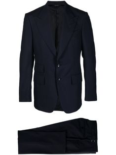 navy blue wool/silk blend Jacket: peak lapels front button fastening jetted chest pocket three side welt pockets long sleeves buttoned cuffs three interior pockets English rear vents Trousers: mid-rise adjustable waist concealed front fastening two side welt pockets two rear button-fastening pockets slim cut