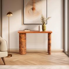 a living room with a couch, table and chair next to a painting on the wall