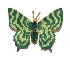 Vintage gold tone, green rhinestones and shades of green enamel butterfly brooch. Some wear. Prefect brooch for spring time! DETAILS: ☼ Approximately 1 3/8 by 1 5/8 inches. ☼ Approximately 7.1 grams, total weight. ☼ ☼ ☼ ☼ ☼ ☼ ☼ ☼ ☼ ☼ ☼ ☼ ☼ ☼ ☼ ☼ ☼ ☼ ☼ ☼ ☼ PLEASE NOTE: ☼ Different items on SALE everyday! Check back often to take advantage of these bargains! ☼ FREE DOMESTIC SHIPPING on purchases of $35 or more. Combined shipping is still available to domestic and international locations. ☼ This sh Vintage Green Brooch Jewelry, Victorian Green Collectible Brooches, Vintage Green Clip-on Jewelry, Green Butterfly Brooch Jewelry, Enamel Butterfly, Luxury Green Pendant-shaped Brooches, Palm Coast, Butterfly Brooch, Green Enamel