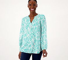 This sassy tunic is so ready to join your everyday fashion rotation and give it the stylish boost it needs. From Susan Graver. Spring Casual Tunic For Day Out, Casual Stretch Tunic For Spring, Casual Fall Tunic For Vacation, Casual Split Neck Tunic For Fall, Casual Stretch Tunic, Fall Split Neck Tunic, Casual Green Split Neck Top, Casual Stretch Top With Split Neck, Spring Casual Tunic For Workwear