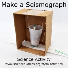 an open cardboard box with a cup inside and the words make a seismoggraph on it