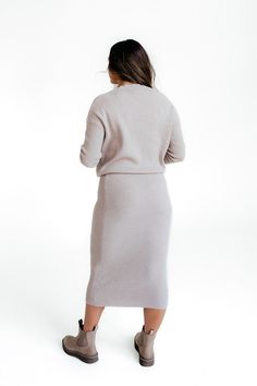 Look fabulous in this season's hottest trend! The Brennan Skirt-Stone is a waffle knit, more fitted skirt with an elastic waist. Wear it with a tucked-in blouse to show off its flattering fit. Look stunning for any occasion! *Fitted* Material Content: 52% Viscose // 28% Polyester // 20% Nylon Material Pattern: Waffle knit Taylor is 5'8" wearing a small Model Measurements: Taylor: Height: 5'8" // Chest: 34" // Waist: 27" // Hips: 38" Click here for matching sweater Not sure what size? See our Siz Chic Lined Skirt For Loungewear, Chic Spring Pencil Skirt With Elastic Waistband, Chic Loungewear Skirt With Elastic Waistband, Elegant Relaxed Knit Skirt, Elegant Knit Relaxed Skirt, Chic Skirt With Elastic Waistband For Loungewear, Fitted Knit Pencil Skirt, Elegant Knit Pencil Skirt, Fall Versatile Relaxed Fit Skirt