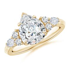 a yellow gold engagement ring with an oval cut diamond surrounded by smaller round brilliant diamonds