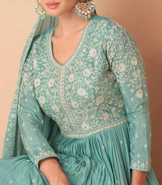 COLOR : Sea Green FABRIC : Top, Bottom & Dupatta - Premium Chinon Silk WORK : Resham Embroidery, Hand Work, Sequins, Motifs, Lace Border OCCASION : Wedding, Reception, Party Wear, Festival READY-TO-WEAR : No STITCHING : Available as semi-stitched fabric, can be stitched using standard size option (+$30). Note: There might be a slight color variation due to lighting and flash used during photoshoot. The bright shade seen is the best closer view of fabric's color. Green Sharara Suit, Green Sharara, Resham Embroidery, Lehenga Style, Sharara Suit, Embroidery Hand, Reception Party, Lace Border, Hand Work