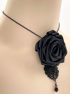 A Gothic Victorian elegant design of a black rose with a gothic ornament pendant and fitting earrings, made to bloom with your goth dress, special event or a casual gothic outfit. Goth fashion is distinguished by darkness, mystery, elegant wardrobe pieces and, smoky makeup even though it may surprise some that not all Goths always wear black. It's said that all Goths have the desire to stand out in a society considered too conformist. - Handmade jewelry - Black Czech high quality teardrop  beads Black Steampunk Jewelry For Halloween, Gothic Black Party Jewelry, Steampunk Black Jewelry For Halloween, Steampunk Black Halloween Jewelry, Halloween Black Steampunk Jewelry, Black Steampunk Jewelry For Party, Gothic Rose Jewelry For Gift, Gothic Rose-colored Jewelry For Gifts, Gothic Rose Colored Jewelry For Gift