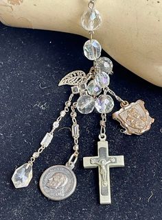 Vintage Silver Rosary Bracelet As Gift, Vintage Nickel-free Crucifix Necklace, Vintage Miraculous Medal Pendant Jewelry, Antique Jewelry With Miraculous Medal For Collectors, Antique Crucifix Collectible Jewelry, Antique Collectible Crucifix Jewelry, Vintage Jewelry With Miraculous Medal For Memorial, Vintage Crucifix Necklace With Miraculous Medal, Vintage Nickel-free Crucifix Jewelry