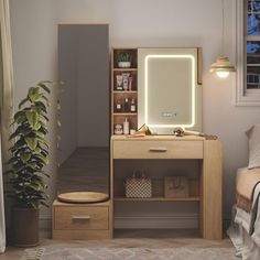 a bedroom with a bed, mirror and plant in the corner on the floor next to it