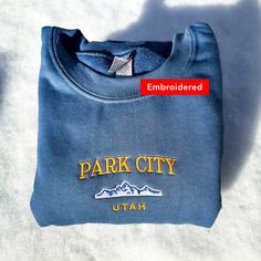 *SIZES ARE UNISEX* -I'd suggest your usual size for a more fitted look, or sizing up for a more relaxed fit. *these sweatshirts are extra comfy when oversized 🗻 "Park City Utah" with a mountain design embroidered on a comfy vintage-style crewneck. Perfect for any occasion or gift for him or her. A sturdy and warm sweatshirt bound to keep you warm in the colder months. A pre-shrunk, classic fit sweater that's made with air-jet spun yarn for a soft feel and reduced pilling. Your new favorite swea City Embroidery, City Sweatshirt, Mountain Design, Retro Ski, Heavy Sweaters, Embroidery Sweater, Park City Utah, Christian Sweatshirt, Mountain Designs