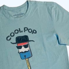 Size Small. New Without Tags. Cool Pop T-Shirt Is A Great Gift For Fathers Day (Pun Intended) Or Any Day! Life Is Good Crusher Tee Features A Red, White & Blue Popsicle With Face & Mustache Wearing Sunglasses & Hat. In New Condition Without Original Tags. No Rips Or Stains. Never Worn Or Washed. Please View Pics Carefully For Condition, Fabric, Care Instructions & Measurements. (Feel Free To Comment Below If Additional Info Is Needed). Please Browse My Closet To Bundle & Save! Thanks For Visitin Cool Pre-shrunk Summer Tops, Fun Light Blue Short Sleeve Top, Blue Fun Top With Funny Print, Blue Tops With Funny Print, Cool Blue Crew Neck Tops, Fun Blue Tops With Screen Print, Fun Blue Cotton T-shirt, Fun Blue Screen Print Tops, Red White Blue Popsicle