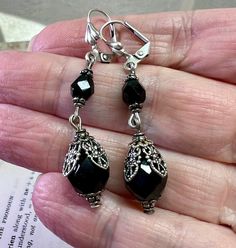 Romantic black beaded earrings with a Vintage feel. They are small earrings about 2 1/4 inches long and all orders come in a gift box or gift bag. Black Beaded Earrings, Victorian Style Earrings, Earrings Gothic, Gothic Earrings, Vintage Style Earrings, Filigree Earrings, Earrings Black, Black Earrings, Small Earrings