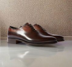 Brilliant craftsmanship is reflected in these handcrafted brown leather one piece Oxford shoes. Take every step with confidence as meticulously executed stitches ensure durability and elegance. we take pride in the timeless style and unparalleled craftsmanship of our shoes. Leather One Piece, Official Wear, Oxford Shoe, Brown Shoes, Mens Dress, Mens Shoes Boots, Timeless Style, Boots Men, Men Dress