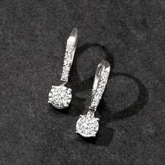 Ross-Simons - 1.00 ct. t. w. Diamond Drop Earrings in 14kt White Gold. Our classic drop earrings suspend .74 ct. t. w. round brilliant-cut diamonds from .26 ct. t. w. diamond-studded leverbacks of polished 14kt white gold. An enduring style that we consider a must, this pair will stay relevant and refined from now until forever! Hanging length is 7/8". Leverback, diamond drop earrings. Diamond birthstones are the perfect gift for April birthdays. Gia Certified Diamond Drop Earrings, Classic Diamond White Drop Earrings, Classic Diamond Drop Earrings With Brilliant Cut, Classic Dangle Diamond Earrings With Accents, Classic White Gold Diamond Drop Earrings, Gia Certified Classic Drop Earrings, Classic Gia Certified Drop Earrings, Brilliant Cut Diamond Dangle Earrings For Anniversary, Gia Certified White Gold Drop Diamond Earrings