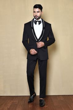 Black full sleeve suit with pleated detailing on collar. Paired with solid shirt, pant and bow. - Aza Fashions Fitted Three-piece Suit With Long Sleeves For Formal Occasions, Formal Three-piece Suit With Long Sleeves, Tailored Three-piece Suit With Long Sleeves For Party, Business Tuxedo Set With Long Sleeves, Formal Long Sleeve Three-piece Suit, Semi-formal Three-piece Tuxedo With Lapel Collar, Fitted Tuxedo Set With Long Sleeves, Semi-formal Three-piece Suit With Long Sleeves, Semi-formal Long Sleeve Suiting Fabric Set