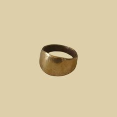 Our handcrafted O'KEEFFE ring embodies the bold, minimalist style of artist and muse Georgia O'Keeffe. Made-to-order from brass, sterling silver, or 10K gold in Los Angeles, CA. Brass Hammered Rings For Promise, Hammered Brass Promise Ring, Hammered Brass Rings For Promise, Unique Hammered Rings With Thick Band, Bronze Hand Forged Ring For Gift, Hand Forged Open Ring Jewelry For Everyday, Heirloom Brass Open Ring Jewelry, Hand Forged Bronze Rings For Gift, Heirloom Style Hand Forged Brass Rings