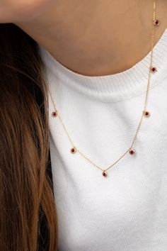 Welcome to PoshGoldJewelry, A new collection of necklaces are now available in our shop. Our gemstone chokers are dainty yet perfect for every woman. Necklace Information: - Material: 14K Solid Gold - Gemstone: CZ Simulated Ruby (Total of 7 stones) - Chain Thickness: 0.70mm - Size of each setting: 4mm A hallmark (stamp) of the material of your necklace will be included for certification. - Gift Box with each order! ✔️ You can contact us for the creation of your custom pendant. ✔️ Contact us for Dainty Red Round Jewelry, Dainty Choker Necklaces For Valentine's Day, Ruby Clavicle Chain Jewelry As Gift, Ruby Clavicle Chain Jewelry Gift, Red Round Jewelry, Red Clavicle Chain Jewelry For Valentine's Day, Red Pendant Chain Necklace With Clavicle Chain, Dainty Choker Jewelry For Valentine's Day, Red Clavicle Chain Necklace For Valentine's Day